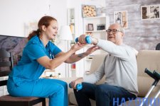 senior-man-nursing-home-with-doing-physical-therapy-with-help-from-nurse-using-dumbbells.jpg